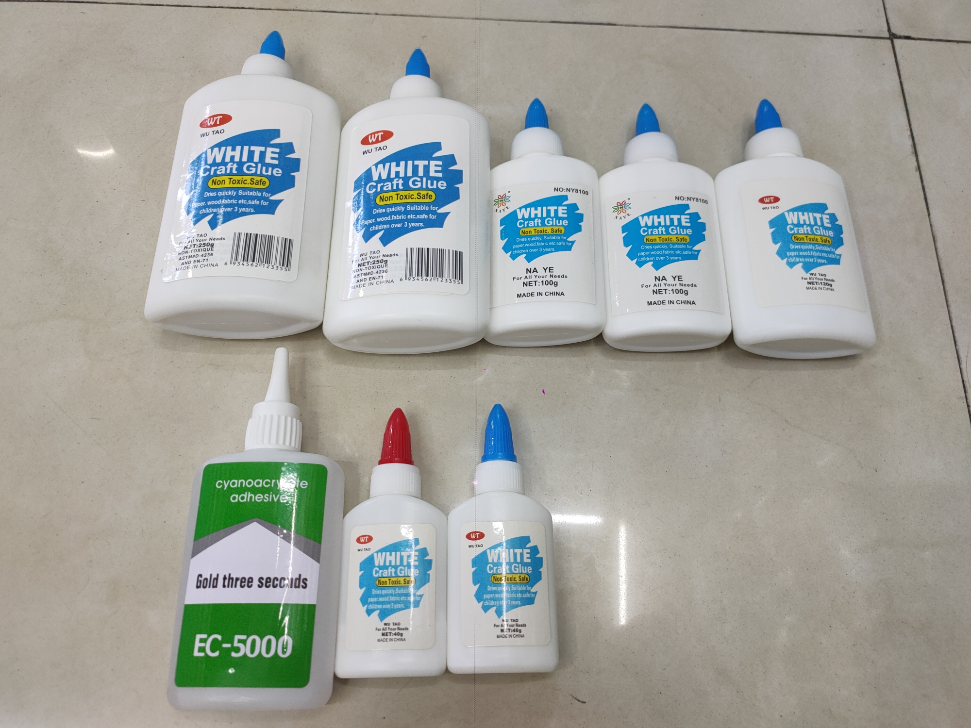 White craft glue squeeze bottles listing from GlueMFG catalog